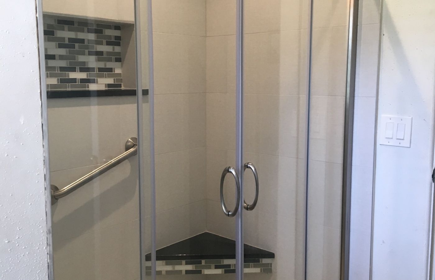 Horizontal Mosaic Accent in a Custom Shower, project view 1.