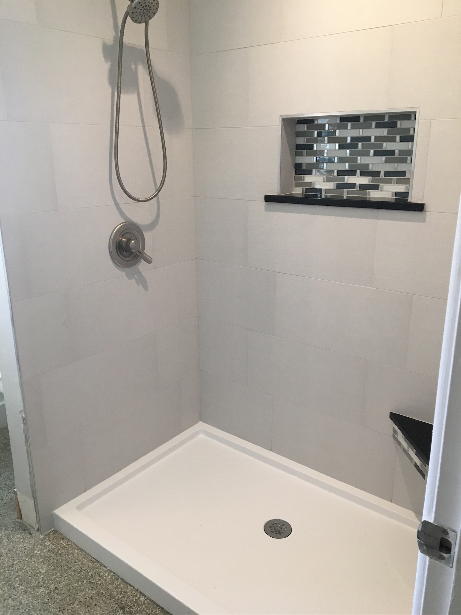 Horizontal Mosaic Accent in a Custom Shower, project view 3.