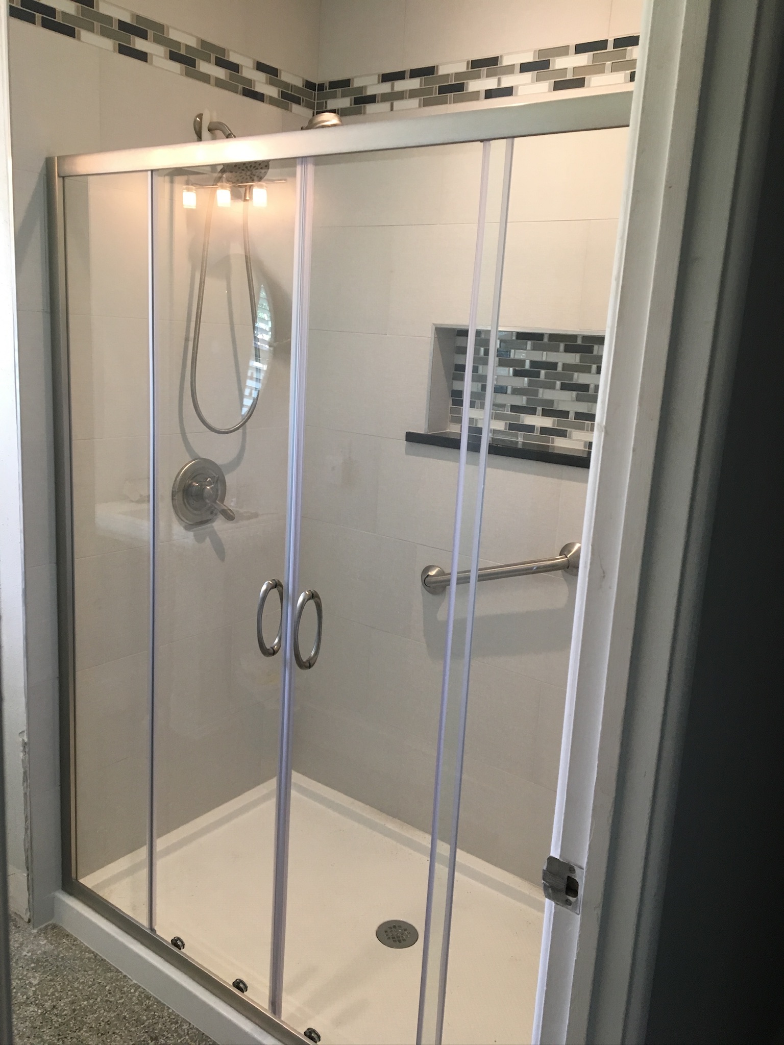 Horizontal Mosaic Accent in a Custom Shower, project view 2.