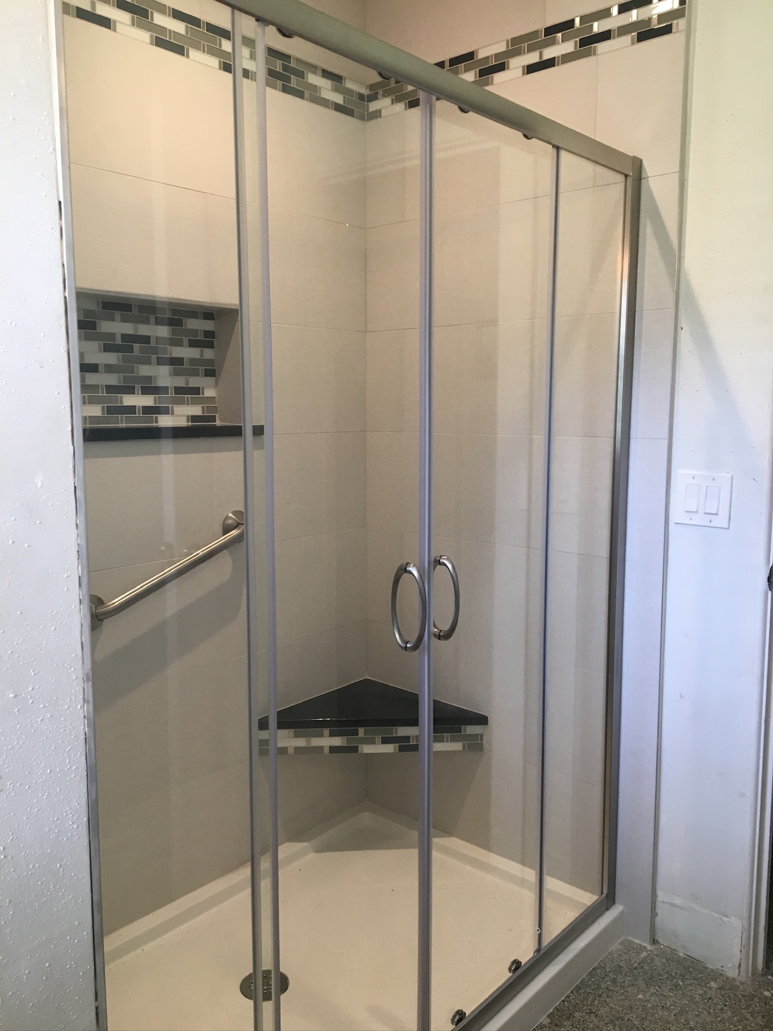 Horizontal Mosaic Accent in a Custom Shower, project view 1.