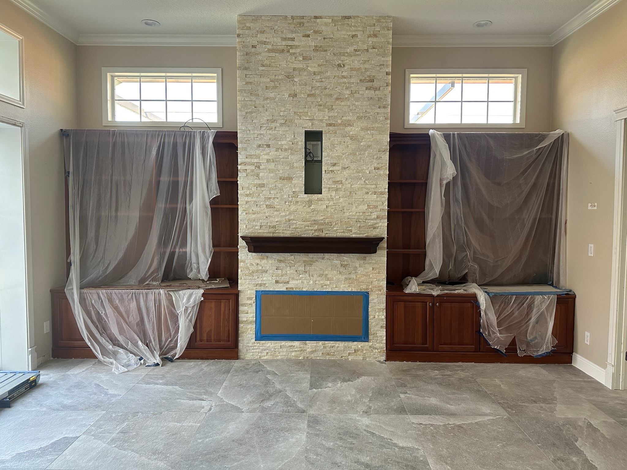 White Stacked Stone Fireplace with Built-In Shelving, project view 6.