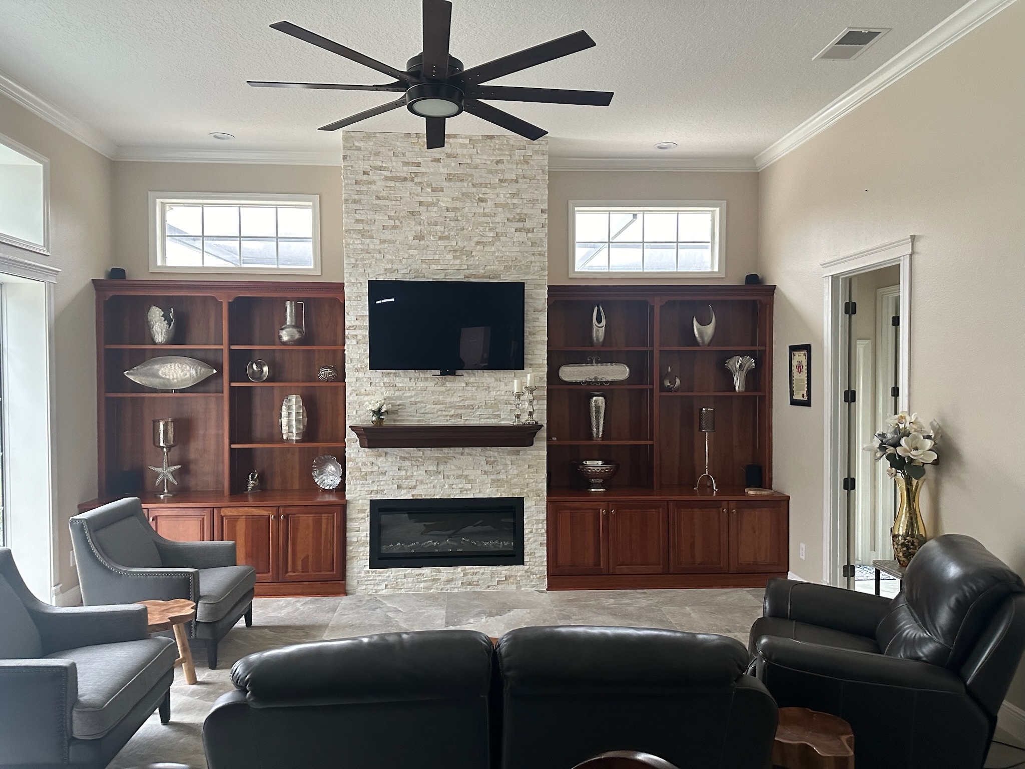 White Stacked Stone Fireplace with Built-In Shelving, project view 3.