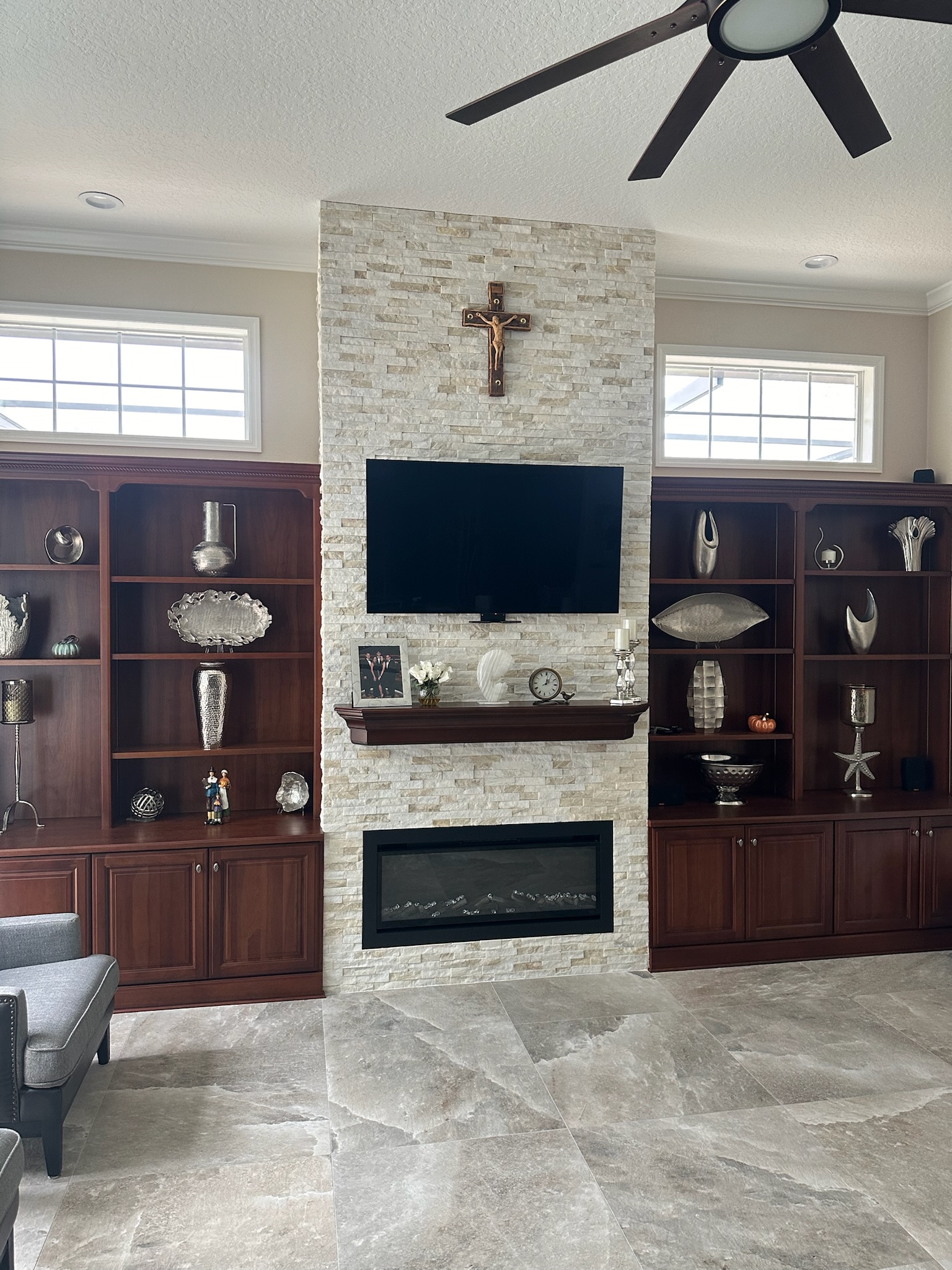 White Stacked Stone Fireplace with Built-In Shelving, project view 2.