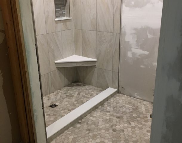 Mosaic Bathroom Floor with a Coordinated Shower Accent, project view 1.