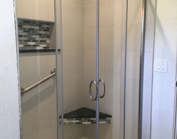 Horizontal Mosaic Accent in a Custom Shower, project view 1.